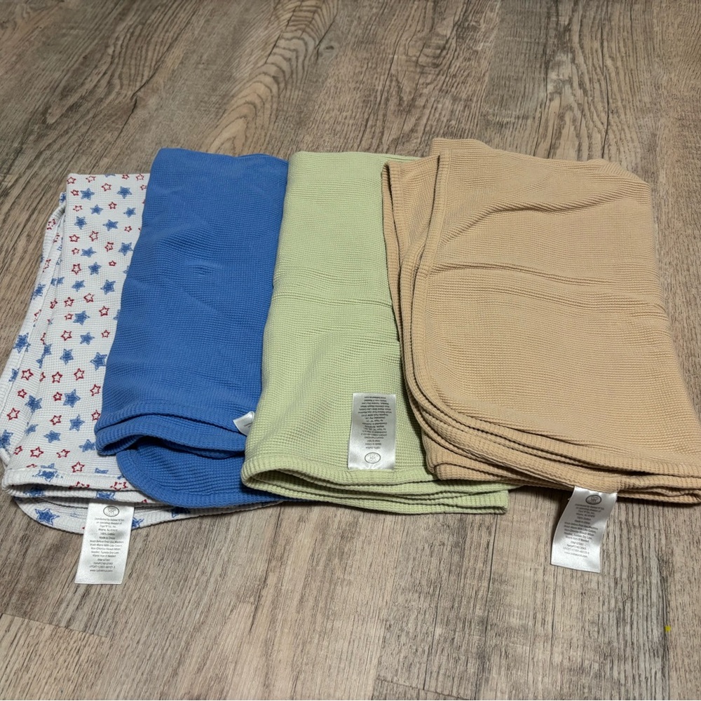 Set of Four Baby Blankets in Blue, Green, Tan, and Star Print